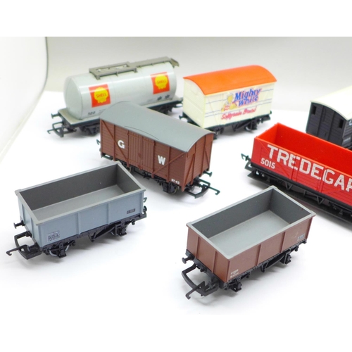 715 - Twelve OO gauge railway wagons including Hornby