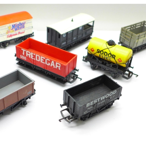 715 - Twelve OO gauge railway wagons including Hornby