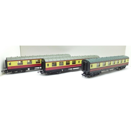 719 - Four OO gauge railway coaches including Hornby