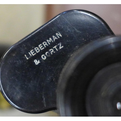 720 - A pair of Lieberman & Gortz 35x60 binoculars, a pair of Mark Scheffel 20x50 binoculars and a pair of... 