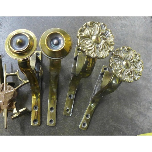 724 - Six pairs of brass curtain pole brackets