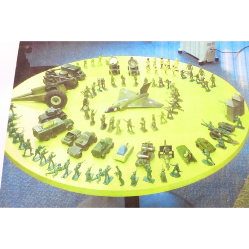 726 - A collection of military die-cast vehicles including large cannon, tank, lorry and armoured vehicle ... 