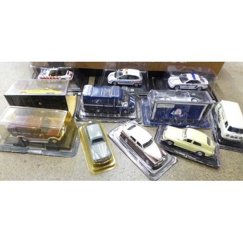 730 - A collection of die-cast model vehicles, packaged, over 25 in total