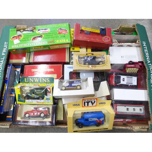 734 - Thirty die-cast model vehicles including Corgi, Matchbox and Lledo, some limited editions, boxed