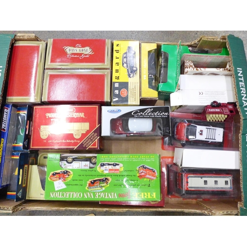 734 - Thirty die-cast model vehicles including Corgi, Matchbox and Lledo, some limited editions, boxed