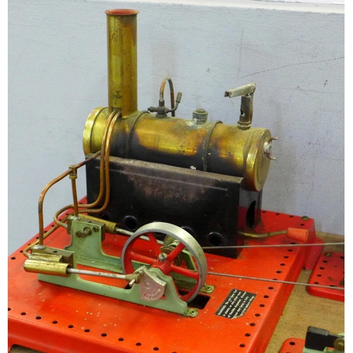 753 - A Mamod twin cylinder super heated steam engine connected to a grinding machine, polishing machine, ... 