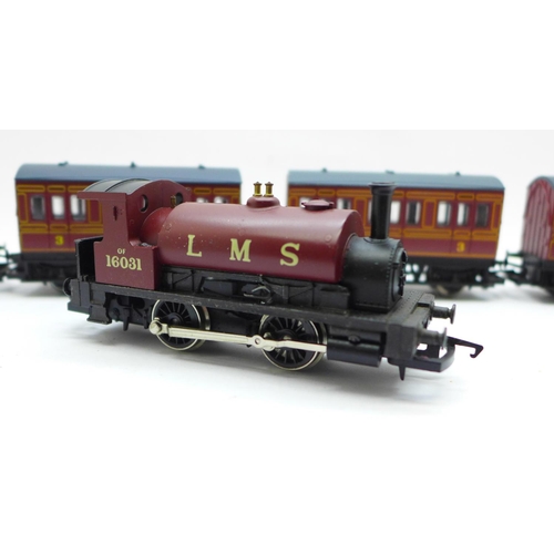 759 - A Hornby OO gauge LMS steam locomotive and four coaches