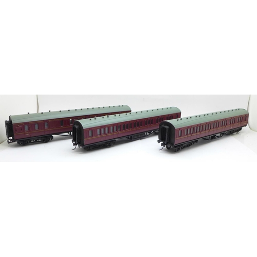 764 - Four OO gauge railway coaches including Tri-ang and Bachmann