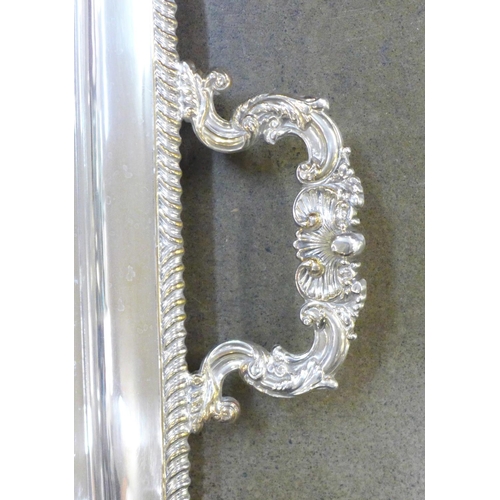 791 - A large silver plated two handled tray, 61cm