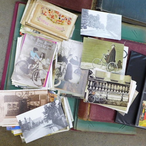 792 - Six empty postcard albums, a small collection of postcards including humorous