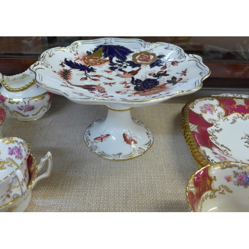 794C - A Coalport six setting part tea set with two sandwich plates and a Coalport Hong Kong tazza