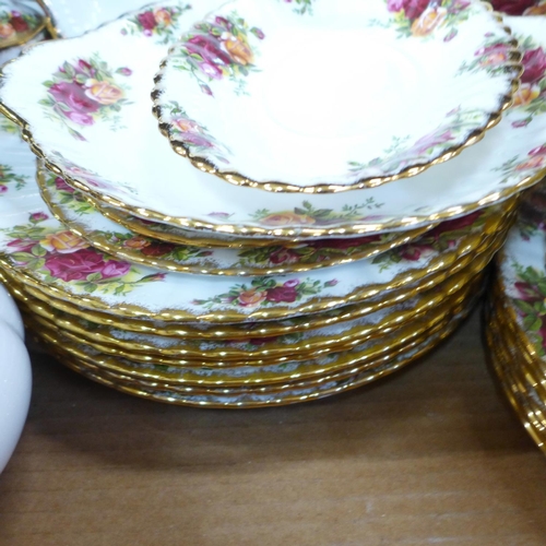 794I - A Royal Albert Old Country Roses six setting tea and dinner service including a three-tier cake stan... 