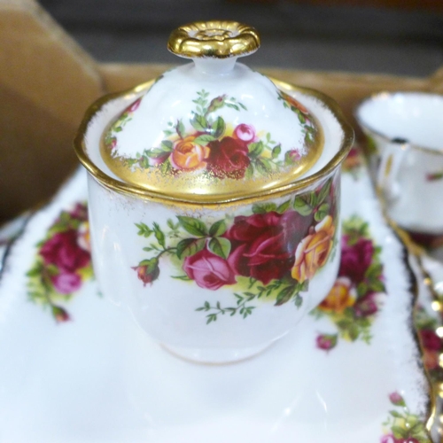 794I - A Royal Albert Old Country Roses six setting tea and dinner service including a three-tier cake stan... 