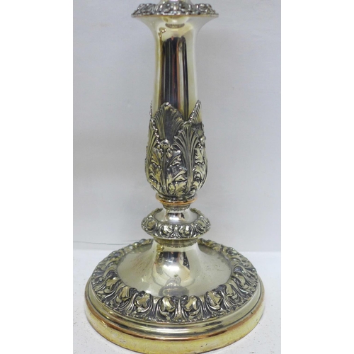 799 - A silver plated candelabra and a pair of plated candlesticks, one candlestick a/f