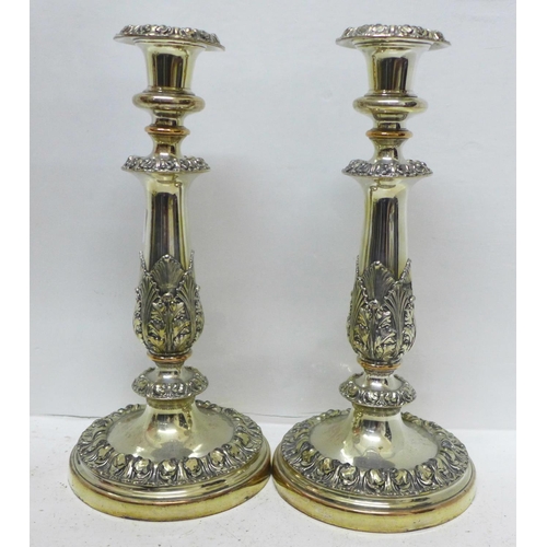 799 - A silver plated candelabra and a pair of plated candlesticks, one candlestick a/f