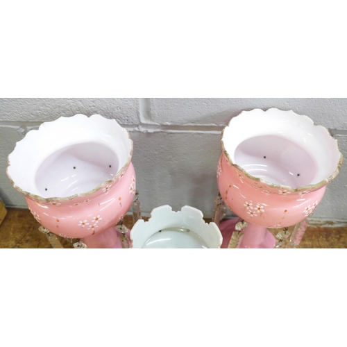 816 - A pair of pink glass lustres, one top chipped and a pale blue glass lustre