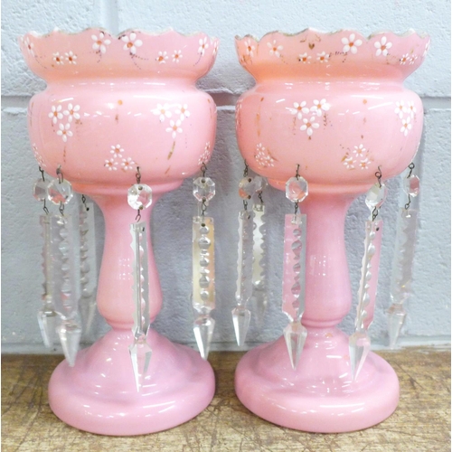 816 - A pair of pink glass lustres, one top chipped and a pale blue glass lustre