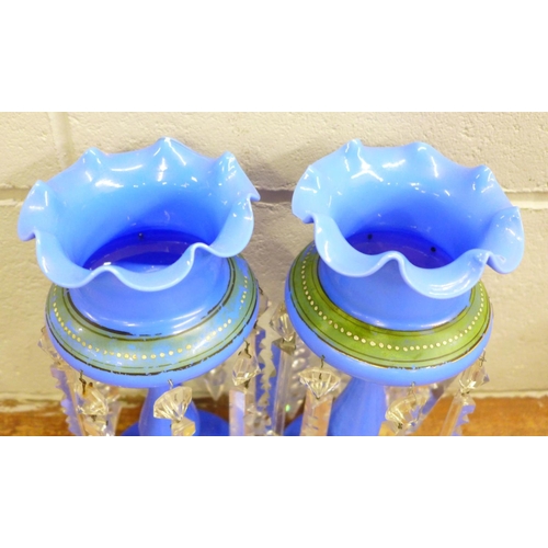 818 - A pair of blue glass lustres and a pair of Victorian glass lustres (small chips to top)