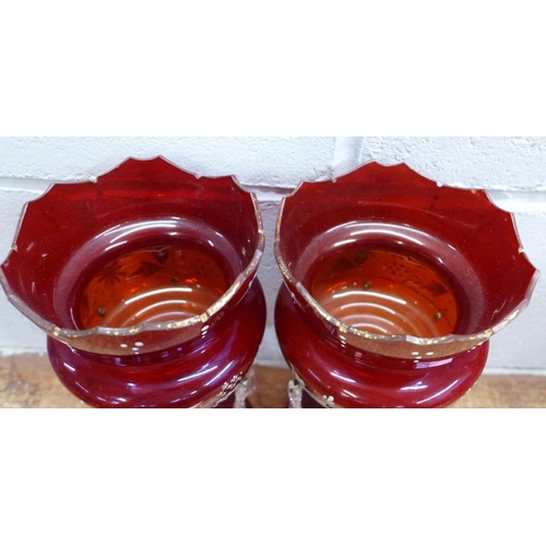 819 - A pair of ruby glass lustres and one other flash cut ruby glass lustre, a/f (small chips to top)