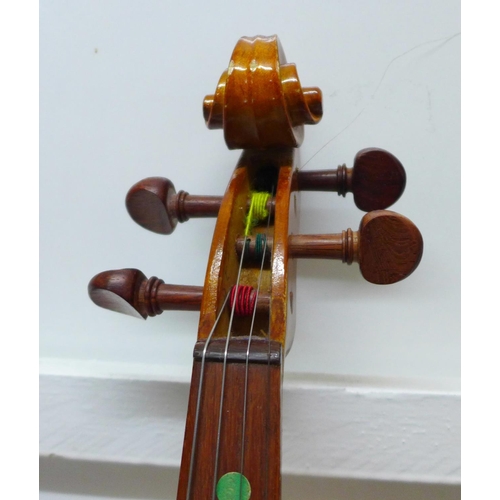 825 - A Chinese student's violin with two bows