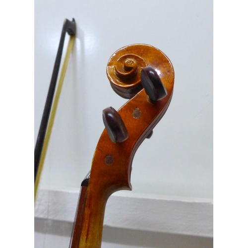 825 - A Chinese student's violin with two bows