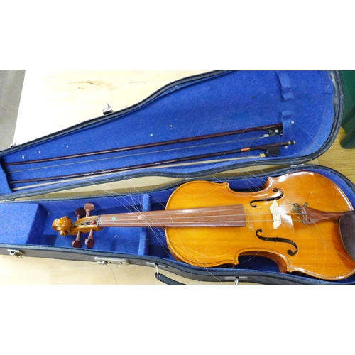 825 - A Chinese student's violin with two bows