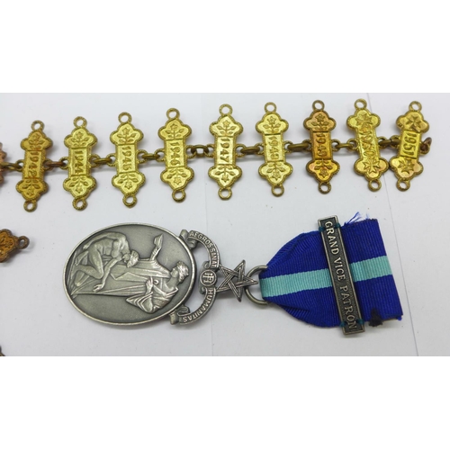 846 - A St. John's Ambulance medal with clasps, 1937, 1938, 1940, 1941, 1942, 1944 and 1945 to 1951 inclus... 