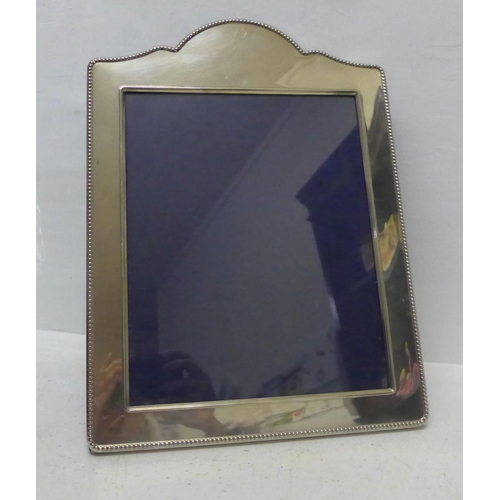 848 - A modern silver photograph frame, Carrs Sheffield, width 26.5cm