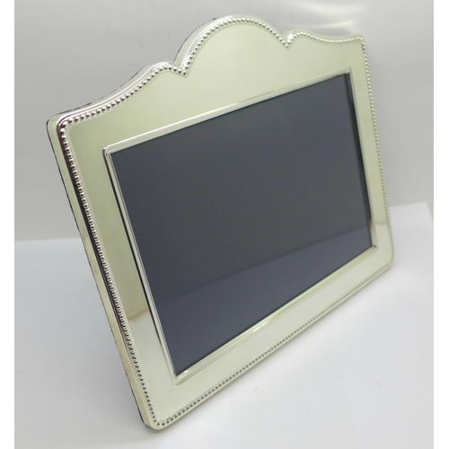 849 - A modern silver photograph frame, Carrs Sheffield, width 21.5cm