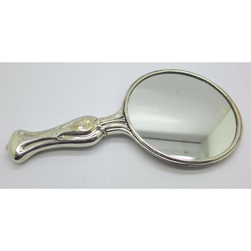 852 - An Art Nouveau silver backed hand mirror, Chester 1906