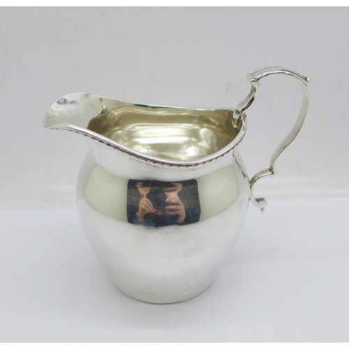 858 - A silver cream jug by George Unite, Birmingham 1919, 89g