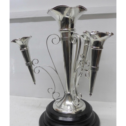 865 - A silver four trumpet epergne, Walker & Hall, Sheffield 1930, 1382g, 44oz., weighted base, height 35... 