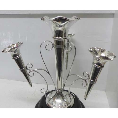 865 - A silver four trumpet epergne, Walker & Hall, Sheffield 1930, 1382g, 44oz., weighted base, height 35... 