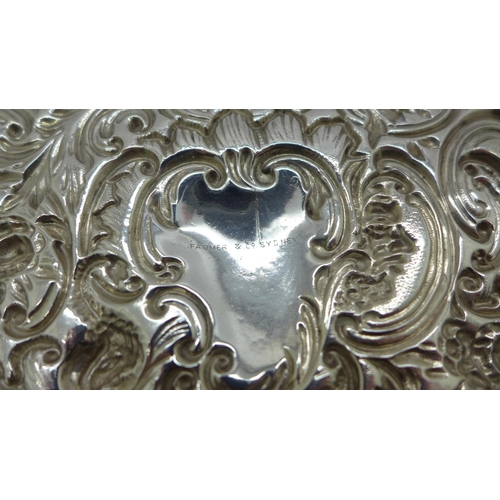 874 - An embossed silver tray, London 1900, William Comyns, 127g, 10.5cm x 24cm