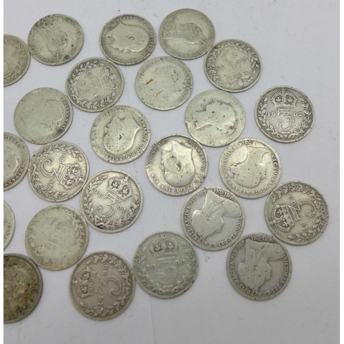 879 - A collection of silver 3d coins including Victorian, 43g