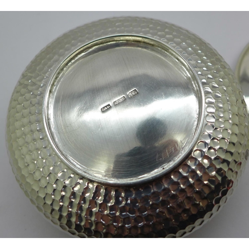 883 - A hammered silver pot with lid, marked '935 silver', 285g