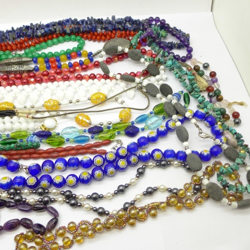 906 - A collection of bead necklaces