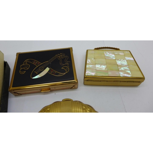 937 - Three musical compacts including one Kigu and one unused Stratton compact, boxed, (musical compacts ... 