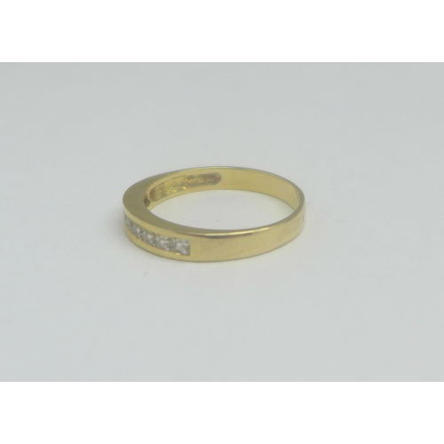 965 - An 18ct gold, nine stone ring, 2.6g, O