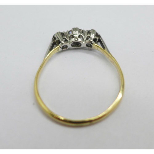 978 - An 18ct gold, three stone diamond trilogy ring, approximately 0.90 carat diamond weight, 2.9g, V