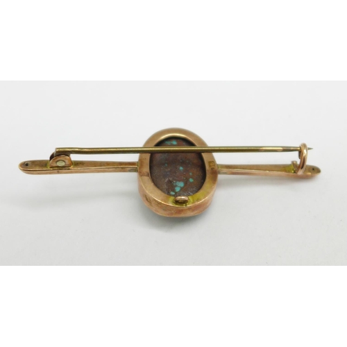 993 - A 9ct gold and turquoise set brooch, 6.6g, stone approximately 14mm x 18mm