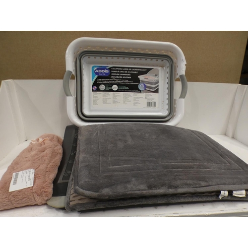 3146 - Two bath mats, laundry basket and hot water bottle (225) * This lot is subject to VAT