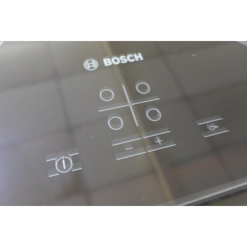 1559 - Bosch Ceramic 4 Burner Hob - Black H45xW592xD522  - model no:- PKE611D17E, RRP £492 inc. VAT * This ... 