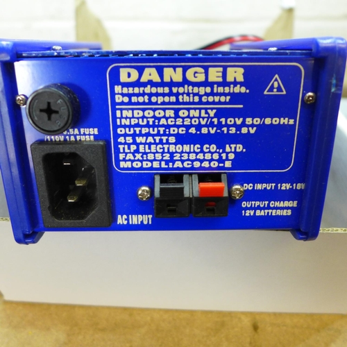 2038 - TLP (Model AC940E) discharge device, boxed & J4 4-8 Cell Perk fast charger