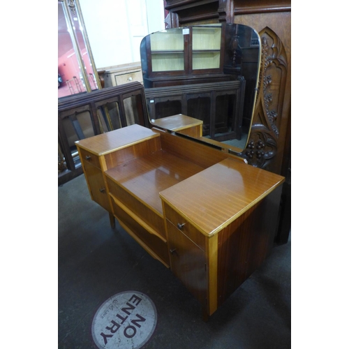 102 - A teak dressing table