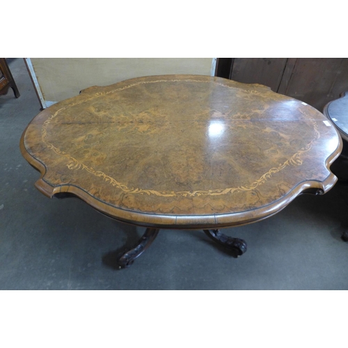 148 - A Victorian inlaid burr walnut serpentine breakfast table