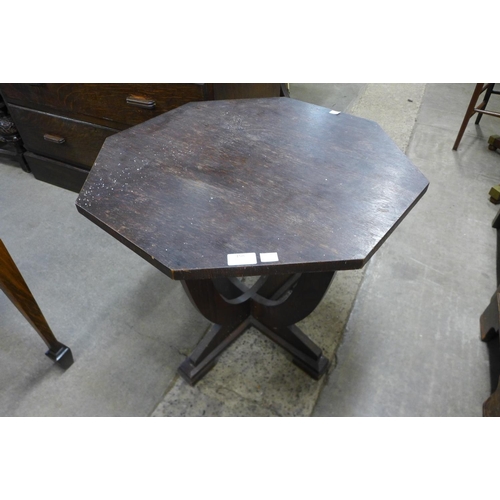 158 - An Art and Crafts oak octagonal occasional table