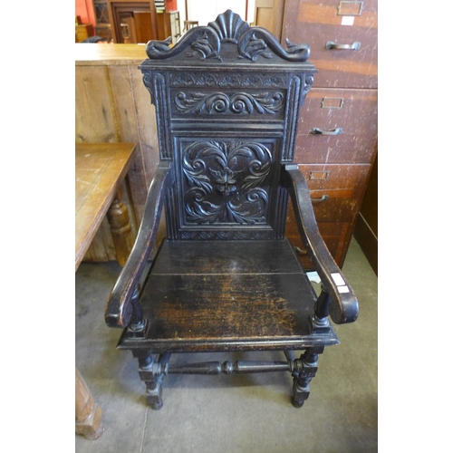 172 - A 17th Century style carved oak Wainscot chair