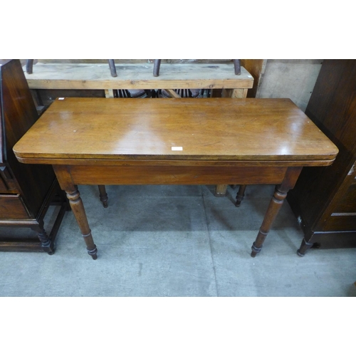 189 - A Victorian mahogany fold over tea table