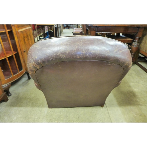 206 - An Art Deco brown leather armchair